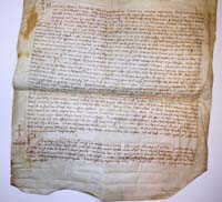 1416, dicembre 5. Istrumento notarile-L'abbazia di Nonantola investe Giuliano Gualengo di un appezzamento di terra boschiva posto in Bondeno (pergamenaceo)